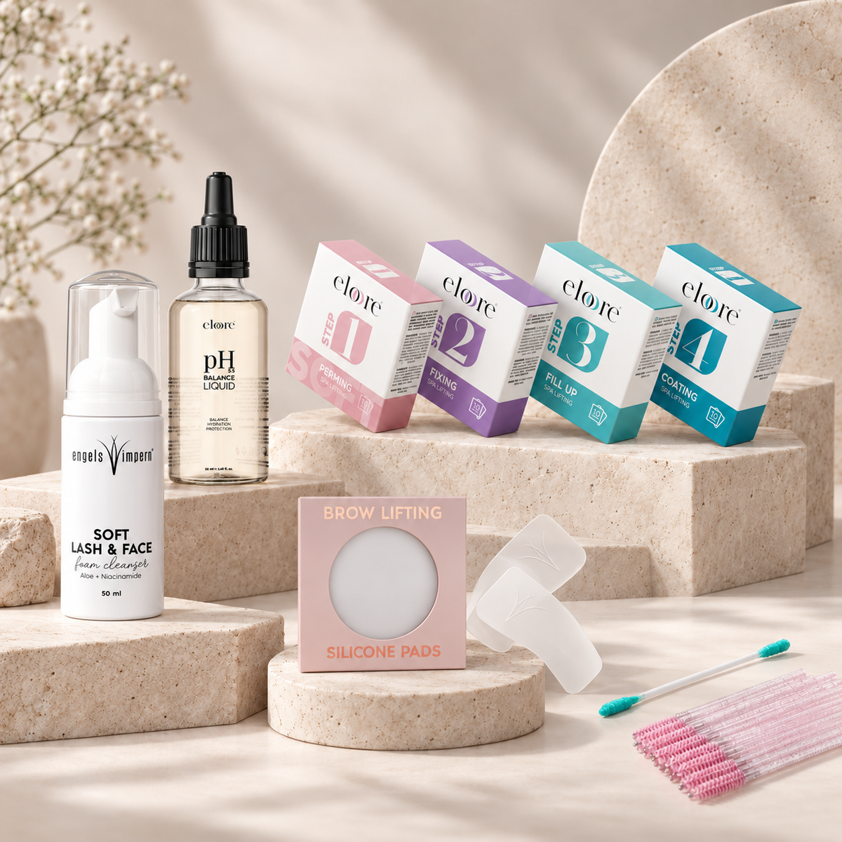 Professionelles Brow Lifting Starterset mit eloore Step 1 bis 4, pH Balance Liquid, Soft Lash and Face Cleanser, Silikonpads und Applikatoren auf ästhetischen Natursteinpodesten